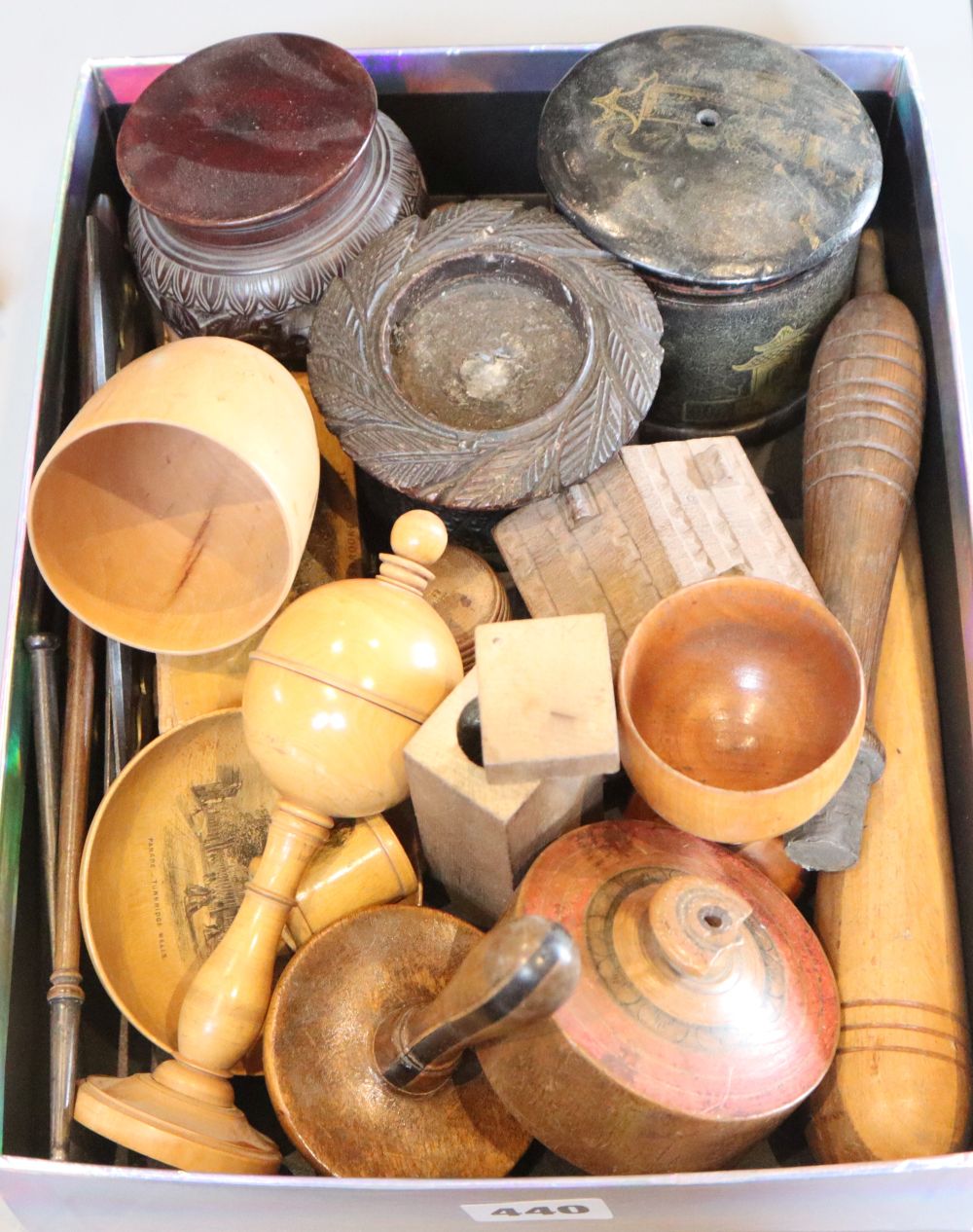 A group of 19th century treen to include a lignum vitae lid, Mauchline wares etc and a papier mache string box